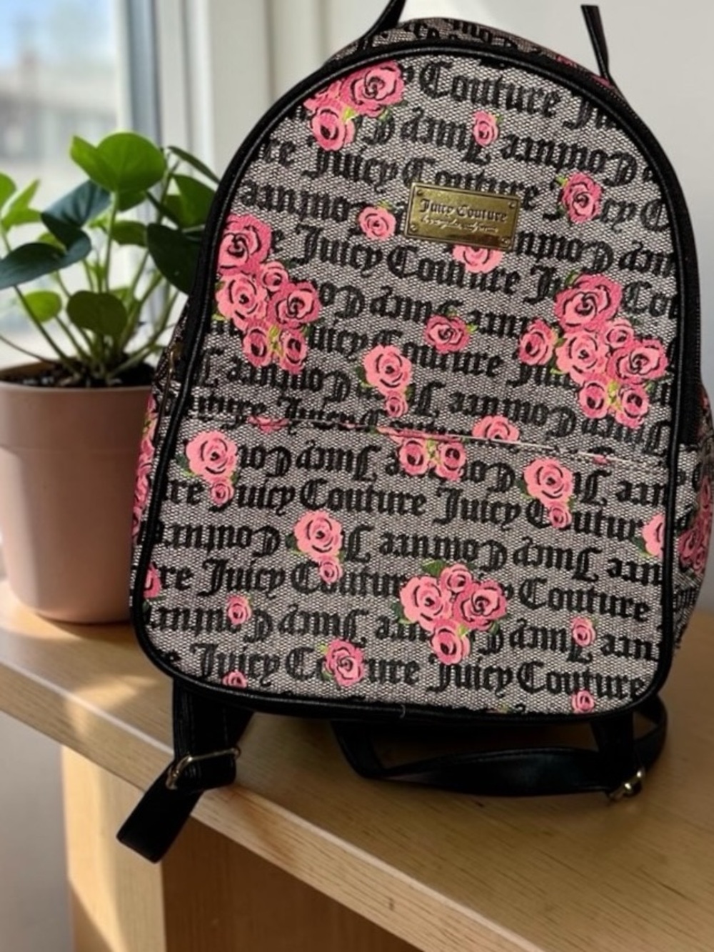 NWOT Juicy Couture Pink Rose Print
Black Logo Faux Leather Backpack
